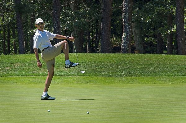 US President Barack Obama reacts to a missed putt on the first green at Farm Neck Golf Club in Oak Bluffs, Massachusetts, August 11, 2013 during the Obama family vacation to Martha's Vineyard.    AFP PHOTO/Jim WATSON        (Photo credit should read JIM WATSON/AFP/Getty Images) (Jim Watson via AFP/Getty Images)