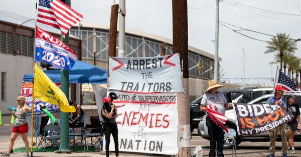 PHOENIX, AZ - MAY 01: Protestors in support of former President Donald Trump gather outside Veterans Memorial Coliseum where Ballots from the 2020 general election wait to be counted on May 1, 2021 in Phoenix, Arizona. The Maricopa County ballot recount comes after two election audits found no evidence of widespread fraud in Arizona.  (Photo by Courtney Pedroza/Getty Images) (Courtney Pedroza / Getty Images)