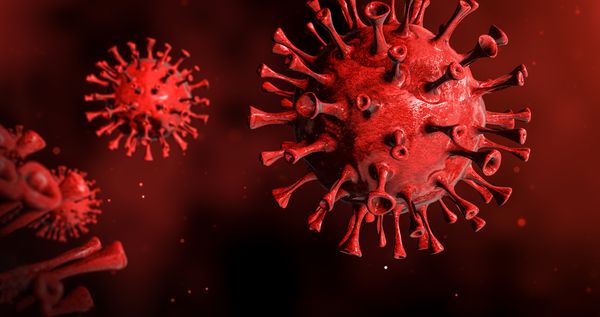 Corona Virus against Red Background 3d Render (Getty Images)