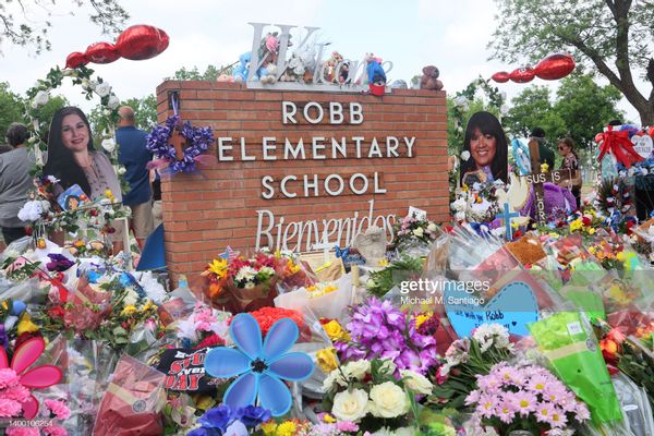 UVALDE, TEXAS - MAY 30: People visit a memorial for the 19 children and two adults killed on May 24th during a mass shooting at Robb Elementary School on May 30, 2022 in Uvalde, Texas. Visitations for Amerie Jo Garza and Maite Rodriguez, two of the 19 children killed in the May 24th Robb Elementary School mass shooting are being held today. Wakes and funerals for the 21 victims will be scheduled throughout the week. (Photo by Michael M. Santiago/Getty Images) (Michael M. Santiago/Getty Images)