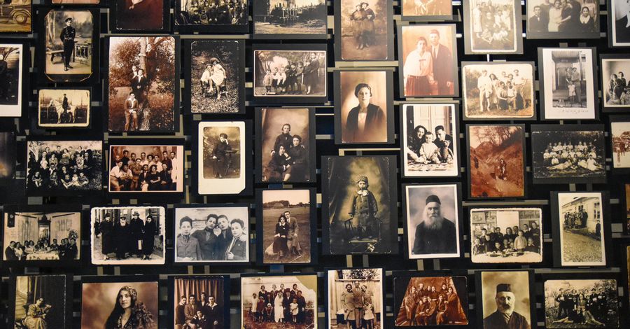 Wall of photographs from Holocaust Museum